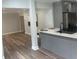 Modern gray kitchen with stainless steel appliances and island with white countertop at 1841 Bayberry Sw Dr, Atlanta, GA 30311