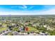 Scenic aerial view of a neighborhood, showing the home's setting near a forest at 2793 Saddle Horn, Snellville, GA 30039