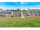 The home's rear exterior, displaying its back yard and patio at 2793 Saddle Horn, Snellville, GA 30039