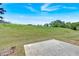 Spacious backyard featuring a well-maintained lawn and a concrete pad at 2793 Saddle Horn, Snellville, GA 30039