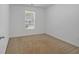 Simple bedroom with neutral walls and carpet, offering a serene atmosphere at 2793 Saddle Horn, Snellville, GA 30039