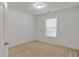 Small bedroom with neutral walls and carpet, and a window at 2793 Saddle Horn, Snellville, GA 30039