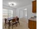 Cozy dining area with natural light, table with seating, and seamless flow from kitchen and living spaces at 2793 Saddle Horn, Snellville, GA 30039