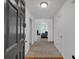 Bright foyer features neutral decor, wood floors, and an inviting view of the living space at 2793 Saddle Horn, Snellville, GA 30039