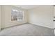 Clean bedroom with carpet and window offering views of the outdoors at 4419 Bellwood Cir, Atlanta, GA 30349