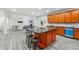 Open-concept kitchen showcases center island, modern appliances, and seamless flow to the living space at 4419 Bellwood Cir, Atlanta, GA 30349