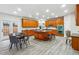 Spacious kitchen features custom wood cabinets, granite countertops, and an eat-in island at 4419 Bellwood Cir, Atlanta, GA 30349