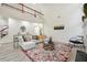Great Room boasts fireplace and soaring ceilings, open to the kitchen with beautiful decor throughout at 4419 Bellwood Cir, Atlanta, GA 30349