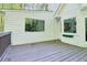 Relaxing outdoor deck offers a perfect spot for enjoying the serene backyard view at 2100 Kings Valley Dr, Lawrenceville, GA 30043