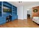 Home office area with built-in shelves and a desk, bathed in natural light at 2100 Kings Valley Dr, Lawrenceville, GA 30043
