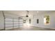 Spacious garage with automatic door and ample lighting at 2526 Abner Nw Pl, Atlanta, GA 30318