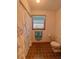 Cozy bathroom featuring a shower-tub combination and soft, natural lighting at 3415 Spot Rd, Cumming, GA 30040