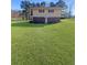 Charming two-story home with a brick facade and a spacious front yard at 3415 Spot Rd, Cumming, GA 30040