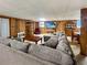 Spacious living room with a large sectional sofa, television, and dining area at 3415 Spot Rd, Cumming, GA 30040