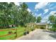 Well-maintained yellow home on a large lot with a fenced backyard and lake access at 590 Yancey Cir, Covington, GA 30014