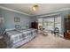 Main bedroom with a bay window overlooking the lake at 590 Yancey Cir, Covington, GA 30014