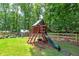 Backyard wooden playset and greenhouse for  at 590 Yancey Cir, Covington, GA 30014