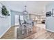 Dining area with stylish decor and plenty of natural light, adjacent to kitchen at 841 Butterworth Rd, Canton, GA 30114