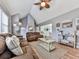 Bright living room with vaulted ceiling, neutral tones, and comfortable seating at 841 Butterworth Rd, Canton, GA 30114