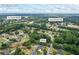 Aerial view of home's location in Buford, GA, near Ivy Creek Rd NE and Camp Branch Rd, surrounded by trees at 2610 Ginger Dr, Buford, GA 30519