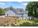 Enjoy a backyard oasis with a sparkling pool and inviting screened-in porch, ideal for relaxation and entertaining at 2610 Ginger Dr, Buford, GA 30519