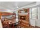 Nicely finished basement with brick fireplace, bunk beds and dining set at 2610 Ginger Dr, Buford, GA 30519