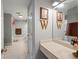 Bathroom with large vanity, framed horse art, and neutral color palette at 2610 Ginger Dr, Buford, GA 30519
