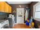 Laundry room with dark brown paint and a window at 2610 Ginger Dr, Buford, GA 30519