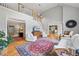 Bright open living room with hardwood floors, high ceilings, and staircase to the second level at 2610 Ginger Dr, Buford, GA 30519