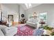 Living room featuring hardwood floors, neutral walls, and comfortable seating at 2610 Ginger Dr, Buford, GA 30519