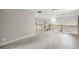 Spacious loft features neutral carpet, white walls, and wood banister adding warmth to the room at 2610 Ginger Dr, Buford, GA 30519