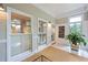 Sunroom featuring light walls and tile floor, perfect for relaxing at 2610 Ginger Dr, Buford, GA 30519