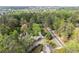 Aerial view of a neighborhood featuring tree-lined streets, well-manicured lawns, and elegant homes at 2811 Shady Valley Ne Dr, Brookhaven, GA 30324