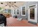 Outdoor deck with room for seating and grilling and a view of the landscaped backyard and home at 2811 Shady Valley Ne Dr, Brookhaven, GA 30324