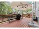 Outdoor deck with room for seating and grilling and a view of the landscaped backyard at 2811 Shady Valley Ne Dr, Brookhaven, GA 30324