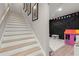 Staircase leading to a finished basement with a colorful play area at 2811 Shady Valley Ne Dr, Brookhaven, GA 30324