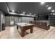 Basement game room with pool table, media area and easy access to outdoor at 2811 Shady Valley Ne Dr, Brookhaven, GA 30324