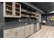 Finished basement bar with counterspace, wet bar, refrigerator, and cabinets at 2811 Shady Valley Ne Dr, Brookhaven, GA 30324