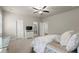 Bright bedroom with white trim, ceiling fan, and an attached bathroom creates a welcoming space at 2811 Shady Valley Ne Dr, Brookhaven, GA 30324