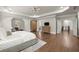 Spacious main bedroom with tray ceilings, hardwood floors, and a seating area at 2811 Shady Valley Ne Dr, Brookhaven, GA 30324
