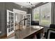 Bright home office with French doors, plantation shutters, and custom trim at 2811 Shady Valley Ne Dr, Brookhaven, GA 30324