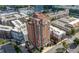Condo building surrounded by city streets, featuring an attractive rooftop design at 3435 Kingsboro Ne Rd # 603, Atlanta, GA 30326