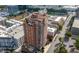 High-angle shot displaying the condo building amidst lush greenery and urban surroundings at 3435 Kingsboro Ne Rd # 603, Atlanta, GA 30326