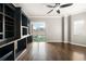 Bright room includes a ceiling fan, built-in shelving, and outdoor access at 3435 Kingsboro Ne Rd # 603, Atlanta, GA 30326