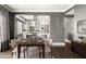Open-concept dining room and kitchen with hardwood floors, neutral tones, and modern decor at 3435 Kingsboro Ne Rd # 603, Atlanta, GA 30326