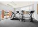 Well-equipped fitness center with modern exercise machines and plenty of natural light at 3435 Kingsboro Ne Rd # 603, Atlanta, GA 30326