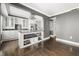 Modern kitchen with an island featuring granite countertops, stainless steel appliances and custom cabinetry at 3435 Kingsboro Ne Rd # 603, Atlanta, GA 30326
