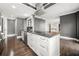 Island kitchen features granite countertops, stainless steel appliances, and ample cabinet space at 3435 Kingsboro Ne Rd # 603, Atlanta, GA 30326