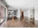 Hardwood floors highlight this spacious living room with open floor plan and access to the balcony at 3435 Kingsboro Ne Rd # 603, Atlanta, GA 30326