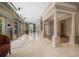 Beautiful lobby with stone floors, elegant columns, and comfortable seating at 3435 Kingsboro Ne Rd # 603, Atlanta, GA 30326